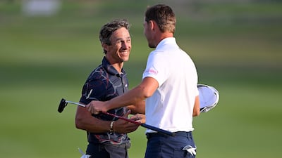 Thorbjorn Olesen of Denmark embraces runner-up and compatriot Rasmus Hojgaard as he celebrates victory on the 18th green. Getty Images