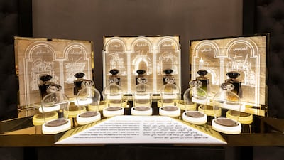 Perfumes displayed with their storied history at Al Bait Dimashqi Perfumes.