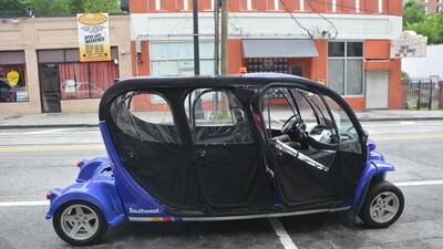 An electric car tour of Atlanta stops on Auburn Avenue (Photo by Rosemary Behan)