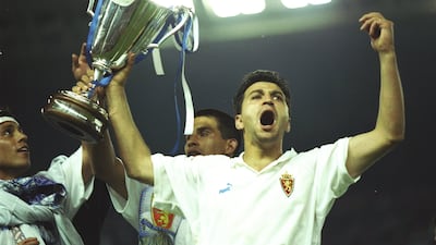 Nayim of Real Zaragoza holds the European Cup Winners' Cup trophy after defeating Arsenal in the final at Parc des Princes in Paris on May 10, 1995. Allsport