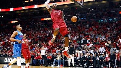 LeBron James dunks for Miami Heat against Oklahoma City Thunder on Christmas Day.