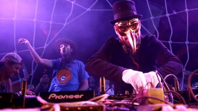 DJ Claptone's trademark Venetian face mask. Getty Images for Coachella
