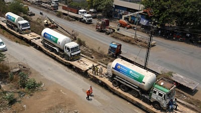 Oxygen tankers on board an 'Oxygen Express' train arrive in Navi Mumbai as India fights against a surge in Covid-19 cases. AFP