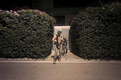 Lebanese security forces outside a house owned by central bank governor Riad Salameh, in Rabieh. Reuters