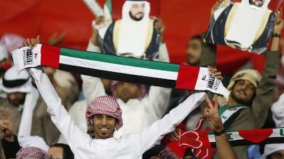UAE's fans cheer for their team during the Gulf Cup final against Iraq.
