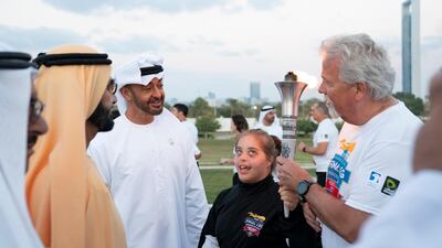 Sheikh Mohamed bin Zayed, Crown Prince of Abu Dhabi and Deputy Supreme Commander of the UAE Armed Forces (3rd L) and Sheikh Mohamed bin Rashid , Vice-President, Prime Minister of the UAE, Ruler of Dubai and Minister of Defence (2nd L), speak with the Special Olympics athlete, during the Determination Retreat at the Presidential Palace. Ryan Carter for the Ministry of Presidential Affairs
