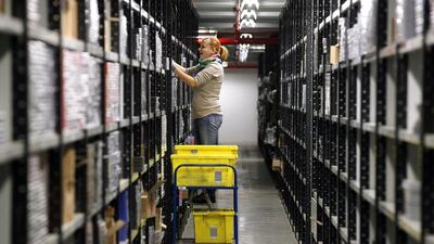 Amazon said it would open five warehouses across India in Chennai, Jaipur, Ahmedabad and Gurgaon, adding to the two it operates near Mumbai and Bangalore. Above, an Amazon warehouse in the UK. Simon Dawson / Bloomberg News