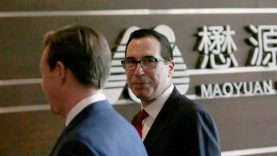 “We are putting the trade war on hold. Right now, we have agreed to put the tariffs on hold while we try to execute the framework,” Mr Mnuchin said in a television interview on Fox News Sunday. REUTERS/Jason Lee/File Photo