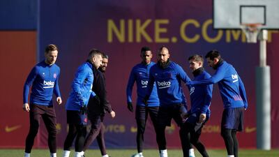 Barcelona's Ivan Rakitic, Jordi Alba, Nelson Semedo, Arturo Vidal and Lionel Messi take part in a training session. Reuters