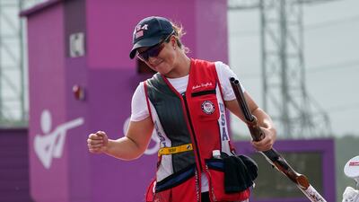 Amber English, of the United States, celebrates after taking the gold medal in the women's skeet.