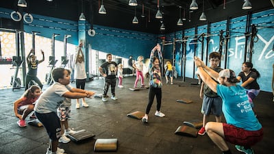Children participate in the CrossFit Kids class at Vogue Fitness - Crossfit Yas. Courtesy Vogue Fitness - Crossfit Yas