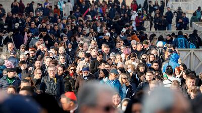 Mourners queue in St Peter's Square. Reuters