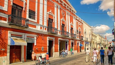 A street scene in Mérida. The city is popular with students and as a base for tourists who are visiting the nearby Mayan ruins. Getty Images