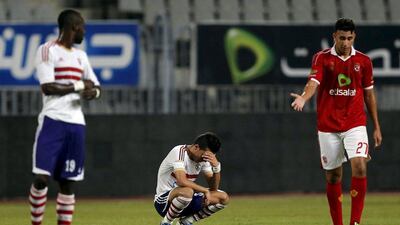 Zamalek's Mostafa Fathi reacts after his side's loss to Al Ahly in the Cairo derby on Tuesday in Alexandria. Amr Abdallah Dalsh / Reuters