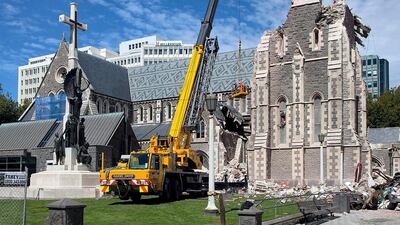 A crane lifting workers up to inspect the damaged Christchurch Cathedral on February 24, 2011, two days after a deadly 6.3 magnitude earthquake rocked New Zealand's second largest city. AFP