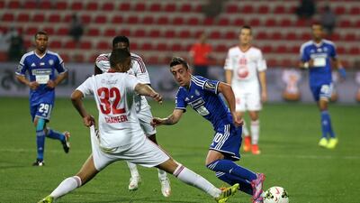 Pablo Hernandez, right, enjoyed a successful debut for Al Nasr, getting on the scoresheet to help his new club win the Arabian Gulf Cup. Pawan Singh / The National