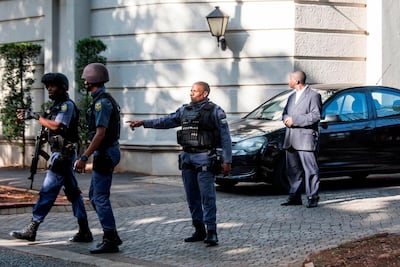 South African police on February 14 raided the Johannesburg house of the Gupta family, which is accused of playing a central role in alleged corruption under scandal-tainted president Jacob Zuma. Wikus de Wet / AFP