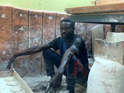A worker at a bakery at the centre of Khartoum, Sudan’s capital, on the eve of the first anniversary of the uprising that toppled the 29-year regime of dictator Omar Al Bashir. A steep hike in the price of bread was the spark behind the uprising that began on December 19, 2018. Photo by Hamza Hendawi for The National.