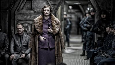 Tilda Swinton, centre, in a scene from the film Snowpiercer. Courtesy Moho Films