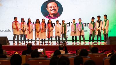 Pupils welcome Mr Muraleedharan to the Indian High School, the oldest Indian education institution in the Gulf region