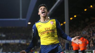 Arsenal's Alexis Sanchez celebrates scoring their second goal against QPR at Loftus Road on Wednesday March 4 2015. Action Images via Reuters / Andrew Couldridge