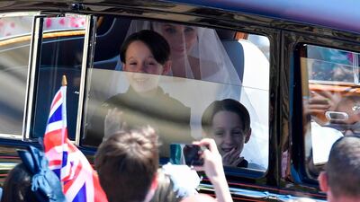 John and Brian Mulroney appeared to love every minute. AFP