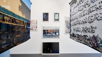 Augustine Paredes's photographic installation 'Am I Driving Safely? Please Call', which documents the lives of delivery truck drivers through their vehicles. Courtesy Warehouse421