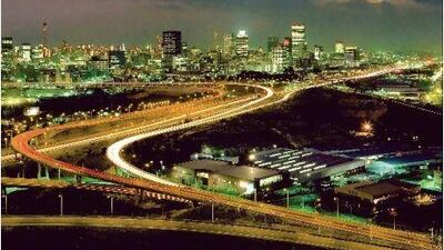 A view of Johannesburg at night. The South African utility Eskom plans to spend 385 billion rand up to 2013 to ramp up power production to prevent shortages. AFP