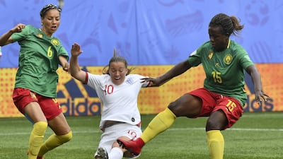 England's forward Francesca Kirby (C) vies with Cameroon's defender Estelle Johnson (L) and Cameroon's defender Ysis Sonkeng during the France 2019 Women's World Cup round of sixteen football match between England and Cameroon at the Hainaut stadium in Valenciennes, northern France. AFP