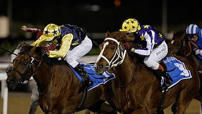 Jesus Rosales rides Samira De Carrere, right, to victory from Sahib Du Clos in the Meydan Horizons Abu Dhabi Championship.