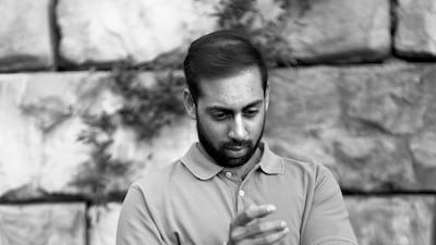 A man gawks at where his phone should be. If only our hands were as interesting as our phones. Courtesy Eric Pickersgill