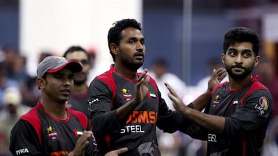 UAE players celebrate a Sri Lankan wicket during the Indoor Cricket World Cup in 2017. Dubai. Chris Whiteoak / The National