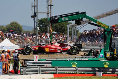 Stewards remove the racing car of Monaco's Formula One driver Charles Leclerc of Scuderia Ferrari during the Formula One Grand Prix of France at the Circuit Paul Ricard in Le Castellet, France, 24 July 2022. EPA / ERIC GAILLARD / POOL