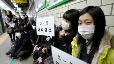Pedestrians ducked into subway stations, office basements and dedicated air-raid shelters for yesterday’s emergency drill.