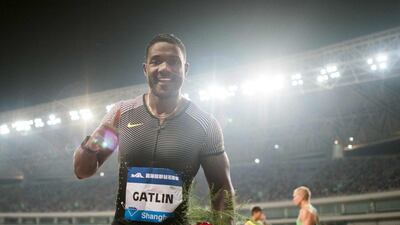 Justin Gatlin celebrates after winning the 100m race at the Shanghai Diamond League. Johannes Eisele / AFP