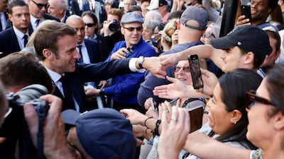 Mr Macron was mobbed by well-wishers on the streets of New Orleans. AFP