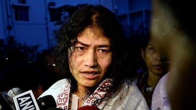 Indian human rights activist Irom Sharmila speaks to the media outside a prison hospital in the northeastern city of Imphal, India, August 20, 2014. After 16 years, Reuters