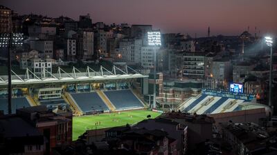 Players warm up in front of empty grandstands before the Kasimpasa Vs Goztepe football match in Istanbul, Turkey. Getty Images