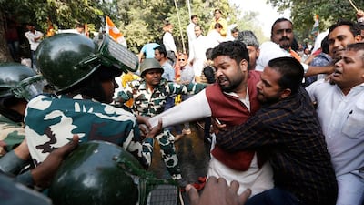 Police detain activists of the youth wing of India's main opposition Congress party during a protest against the government's decision to withdraw 500 and 1000 Indian rupee banknotes from circulation. Adnan Abidi / Reuters