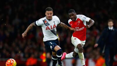 Kyle Walker, left, battles for the ball with Joel Campbell. Julian Finney / Getty Images