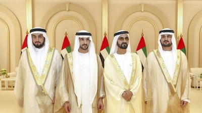 Sheikh Mohammed bin Rashid, Vice President and Ruler of Dubai, stands for a photograph with his sons, the grooms, Sheikh Hamdan bin Mohammed, Crown Prince of Dubai, Sheikh Maktoum bin Mohammed, Deputy Ruler of Dubai, and Sheikh Ahmed bin Mohammed, Chairman of the Mohammed bin Rashid Al Maktoum Knowledge Foundation. Courtesy Dubai Media Office
