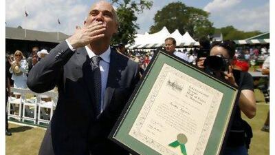 Andre Agassi blows a kiss to the crowd after being inducted into the Hall of Fame.