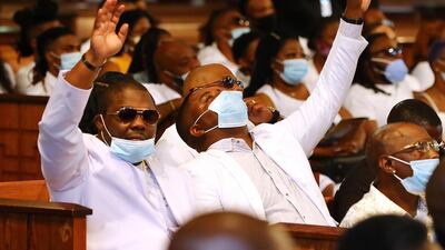 Family members and friends react during the musical performance 'Encourage Yourself by Kelly Price'., EPA