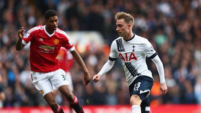 Christian Eriksen of Tottenham Hotspur is watched by Marcus Rashford of Manchester United during the Premier League match between Tottenham Hotspur and Manchester United at White Hart Lane on April 10, 2016 in London, England. (Photo by Julian Finney/Getty Images)