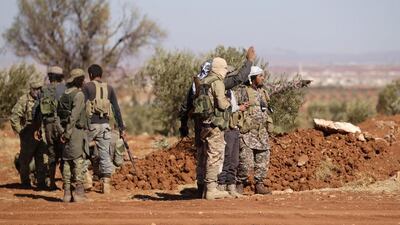 Rebel fighters gather during their advance towards the ISIL-held city of Al Bab, northern Syria on October 26, 2016. Khalil Ashawi/Reuters