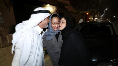 Hannan Iskandar is kissed by her parents, after she drove her car in her neighbourhood, in Al Khobar, Saudi Arabia. Hamad I Mohammed / Reuters