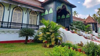 The sprawling facade of the Figuerado mansion, with balconies running along either side. Courtesy Charukesi Ramadurai