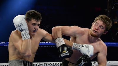 Vito Mielnicki (white trunks) and Corey Champion (green trunks) box during their welterweight bout at MGM Grand Garden Arena, Las Vegas. Reuters