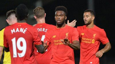 Daniel Sturridge, centre, has voiced his concern over being played in a wide position instead of his preferred centre-forward role. Oli Scarff / AFP