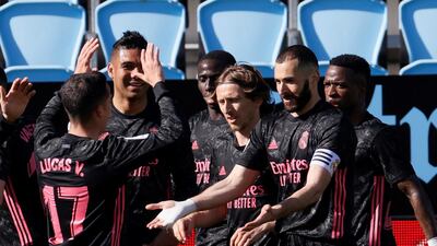 Karim Benzem celebrates after opening the scoring in Real Madrid's 3-1 La Liga victory over Celta Vigo at the Balaidos stadium on Sunday, March 20.. EPA